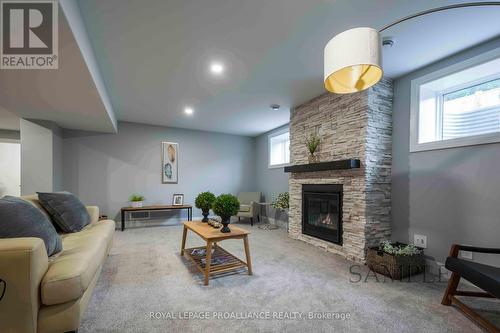 28 Mackenzie John Crescent, Brighton, ON - Indoor Photo Showing Living Room With Fireplace