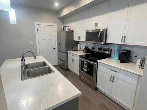 1611 Phillips Street, Merritt, BC - Indoor Photo Showing Kitchen With Double Sink