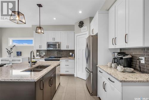 922 Kloppenburg Crescent, Saskatoon, SK - Indoor Photo Showing Kitchen With Stainless Steel Kitchen With Double Sink With Upgraded Kitchen