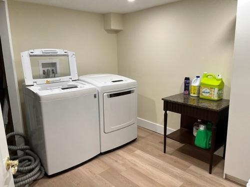Salle de lavage - 185 Boul. Simard, Saint-Lambert, QC - Indoor Photo Showing Laundry Room
