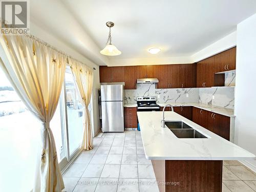 20 Sandhill Crane Dr, Wasaga Beach, ON - Indoor Photo Showing Kitchen With Double Sink