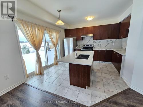 20 Sandhill Crane Drive, Wasaga Beach, ON - Indoor Photo Showing Kitchen With Double Sink