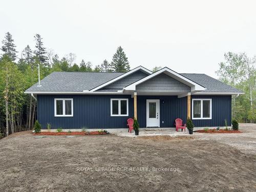 581 Pike Bay Rd, Northern Bruce Peninsula, ON - Outdoor With Facade