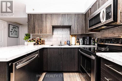 #306 -1450 Bishops Gate, Oakville, ON - Indoor Photo Showing Kitchen With Double Sink