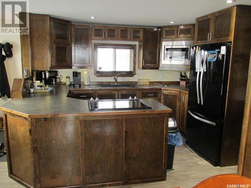 600 8Th Avenue W, Nipawin, SK - Indoor Photo Showing Kitchen With Double Sink