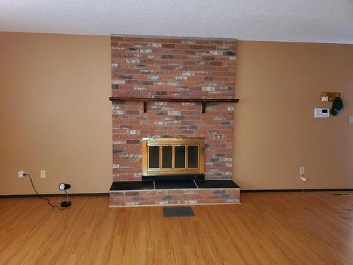 2305 4Th Street, Cranbrook, BC - Indoor Photo Showing Other Room With Fireplace