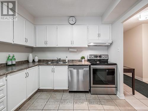 #201 -66 High St E, Mississauga, ON - Indoor Photo Showing Kitchen With Double Sink