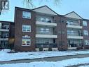 101 250 Athabasca Street E, Moose Jaw, SK  - Outdoor With Balcony With Facade 