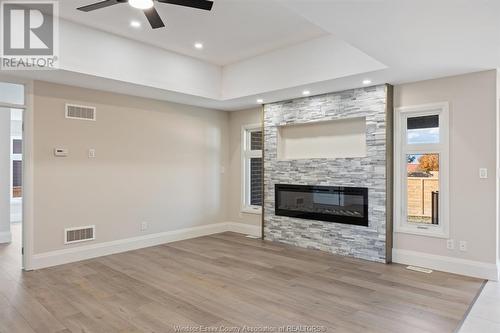 18 Woodland, Kingsville, ON - Indoor Photo Showing Living Room With Fireplace