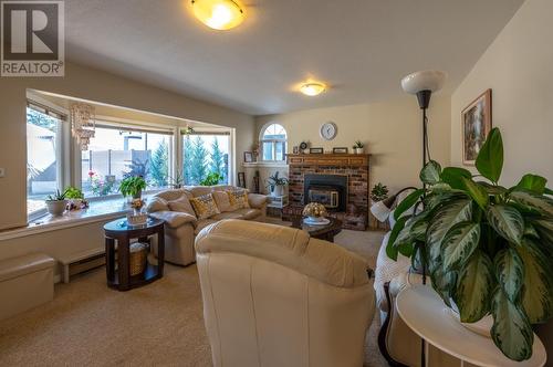 6764 Lakeside Drive, Oliver, BC - Indoor Photo Showing Living Room With Fireplace