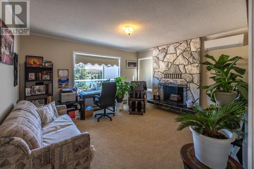 6764 Lakeside Drive, Oliver, BC - Indoor Photo Showing Living Room With Fireplace