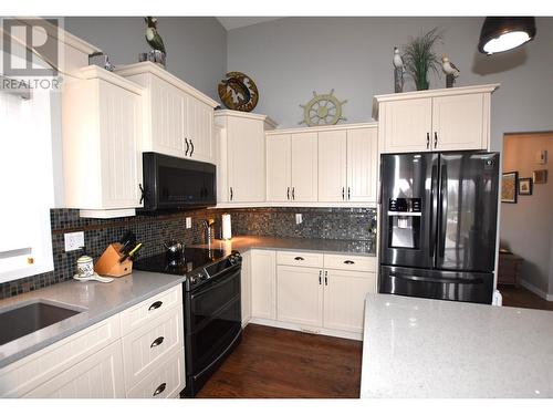 605 Elk Street, Vernon, BC - Indoor Photo Showing Kitchen With Double Sink