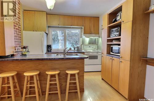 546 7Th Street E, Prince Albert, SK - Indoor Photo Showing Kitchen With Double Sink