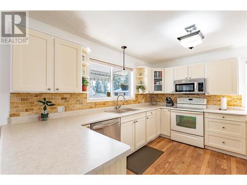 107 Crown Crescent, Vernon, BC - Indoor Photo Showing Kitchen With Double Sink