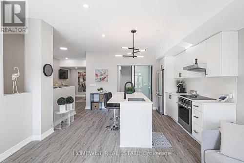 #207 -485 Logan Ave, Toronto, ON - Indoor Photo Showing Kitchen With Upgraded Kitchen