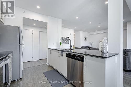 201 - 8 Culinary Lane, Barrie, ON - Indoor Photo Showing Kitchen With Upgraded Kitchen