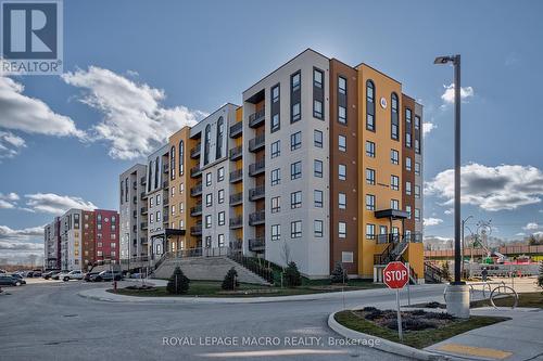 201 - 8 Culinary Lane, Barrie, ON - Outdoor With Facade