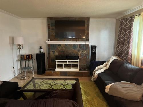 6867 Herry Road, Vernon, BC - Indoor Photo Showing Living Room With Fireplace