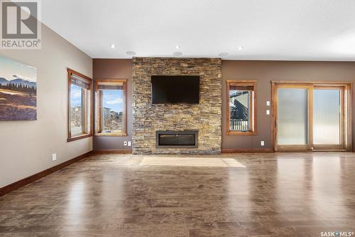 4877 Upson Road, Regina, SK - Indoor Photo Showing Living Room With Fireplace