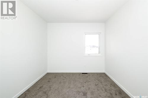 10 Plains Green, Pilot Butte, SK - Indoor Photo Showing Other Room