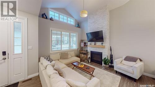 4301 Senecal Drive, Regina, SK - Indoor Photo Showing Living Room With Fireplace