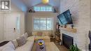 4301 Senecal Drive, Regina, SK  - Indoor Photo Showing Living Room With Fireplace 