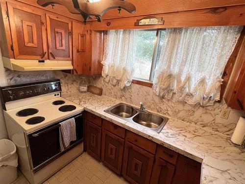 248 Davies Street, Ignace, ON - Indoor Photo Showing Kitchen With Double Sink