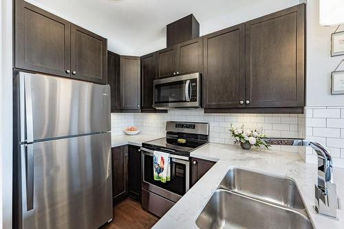 101 Locke Street S|Unit #411, Hamilton, ON - Indoor Photo Showing Kitchen With Stainless Steel Kitchen With Double Sink With Upgraded Kitchen