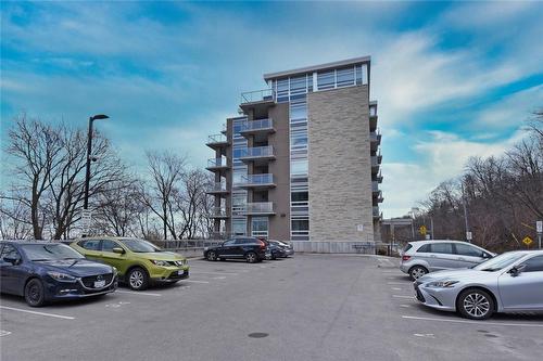 Visitor Parking on Ground Level - 479 Charlton Avenue E|Unit #605, Hamilton, ON - Outdoor With Facade