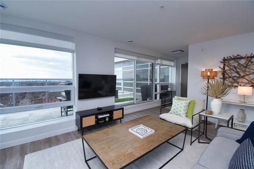 View facing Tiled Terrace and Lake Ontario - 479 Charlton Avenue E|Unit #605, Hamilton, ON - Indoor Photo Showing Living Room