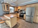 7 Banville Street, Saint-Quentin, NB  - Indoor Photo Showing Kitchen With Double Sink 