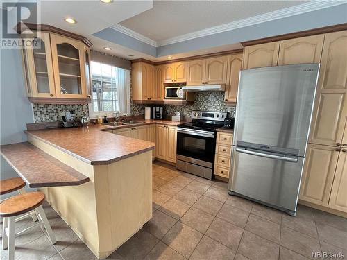 7 Banville Street, Saint-Quentin, NB - Indoor Photo Showing Kitchen With Double Sink