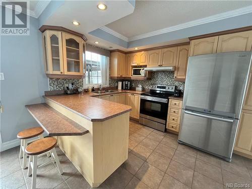 7 Banville Street, Saint-Quentin, NB - Indoor Photo Showing Kitchen With Double Sink