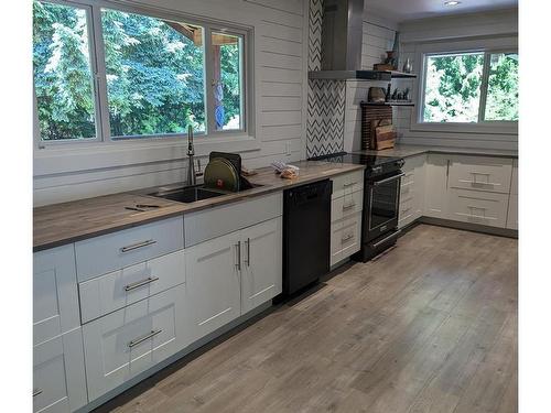 2 Tsitika Cres, Woss, BC - Indoor Photo Showing Kitchen With Double Sink