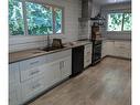 2 Tsitika Cres, Woss, BC  - Indoor Photo Showing Kitchen With Double Sink 