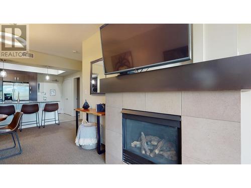 7343 Okanagan Landing Road Unit# 1233, Vernon, BC - Indoor Photo Showing Other Room With Fireplace