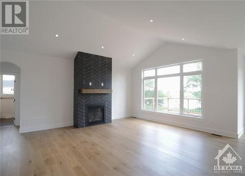 Lot 8 Flanders Road, Brockville, ON - Indoor Photo Showing Living Room With Fireplace