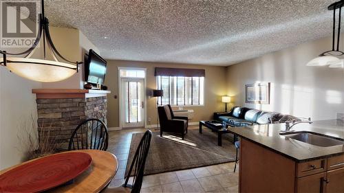 400 Bighorn  Boulevard Unit# 415 G, Radium Hot Springs, BC - Indoor With Fireplace