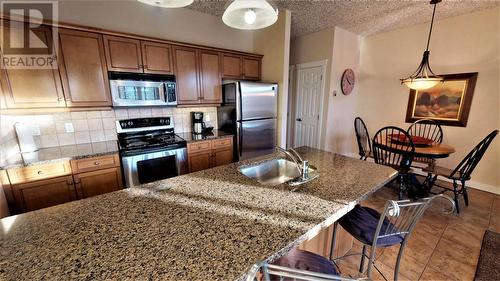 400 Bighorn  Boulevard Unit# 415 G, Radium Hot Springs, BC - Indoor Photo Showing Kitchen With Stainless Steel Kitchen