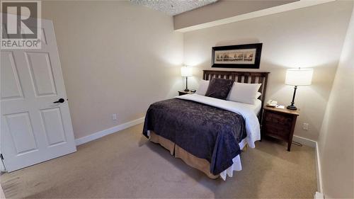 400 Bighorn  Boulevard Unit# 415 G, Radium Hot Springs, BC - Indoor Photo Showing Bedroom