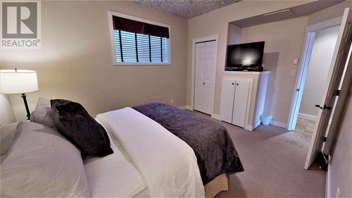 400 Bighorn  Boulevard Unit# 415 G, Radium Hot Springs, BC - Indoor Photo Showing Bedroom