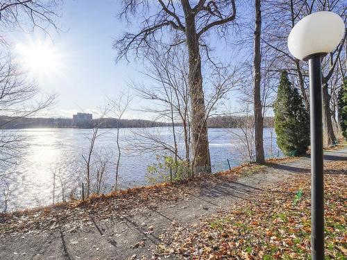 Bord de l'eau - 402-4540 Prom. Paton, Laval (Chomedey), QC - Outdoor With Body Of Water With View