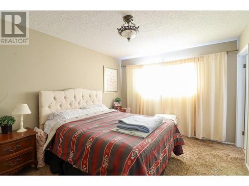 1532 Carmi Avenue, Penticton, BC - Indoor Photo Showing Bedroom