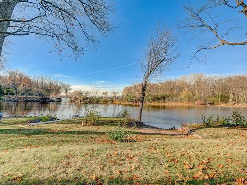 Waterfront - 64C Rue Des Ormes, Vaudreuil-Sur-Le-Lac, QC - Outdoor With Body Of Water With View