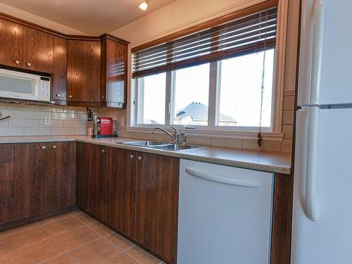 Cuisine - 7-4585 Ch. Des Prairies, Brossard, QC - Indoor Photo Showing Kitchen With Double Sink
