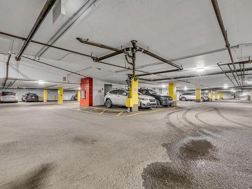 Parking - 205-33 Rue St-Louis, Québec (La Cité-Limoilou), QC - Indoor Photo Showing Garage