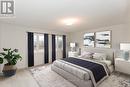 27 Pearl St, Wasaga Beach, ON  - Indoor Photo Showing Bedroom 