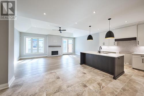 464 Old Course Trail, Welland, ON - Indoor Photo Showing Kitchen With Fireplace