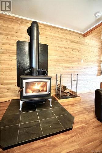 47 Old Schoolhouse Road, Rollingdam, NB - Indoor With Fireplace