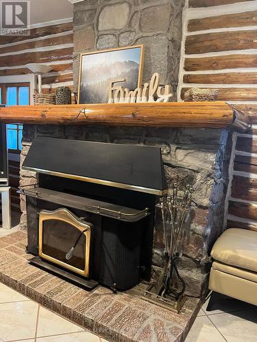 108 Coldstream Rd, Kawartha Lakes, ON - Indoor Photo Showing Other Room With Fireplace